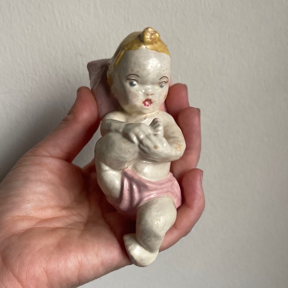 Vintage Chalkware Baby Holding Toe Figurine